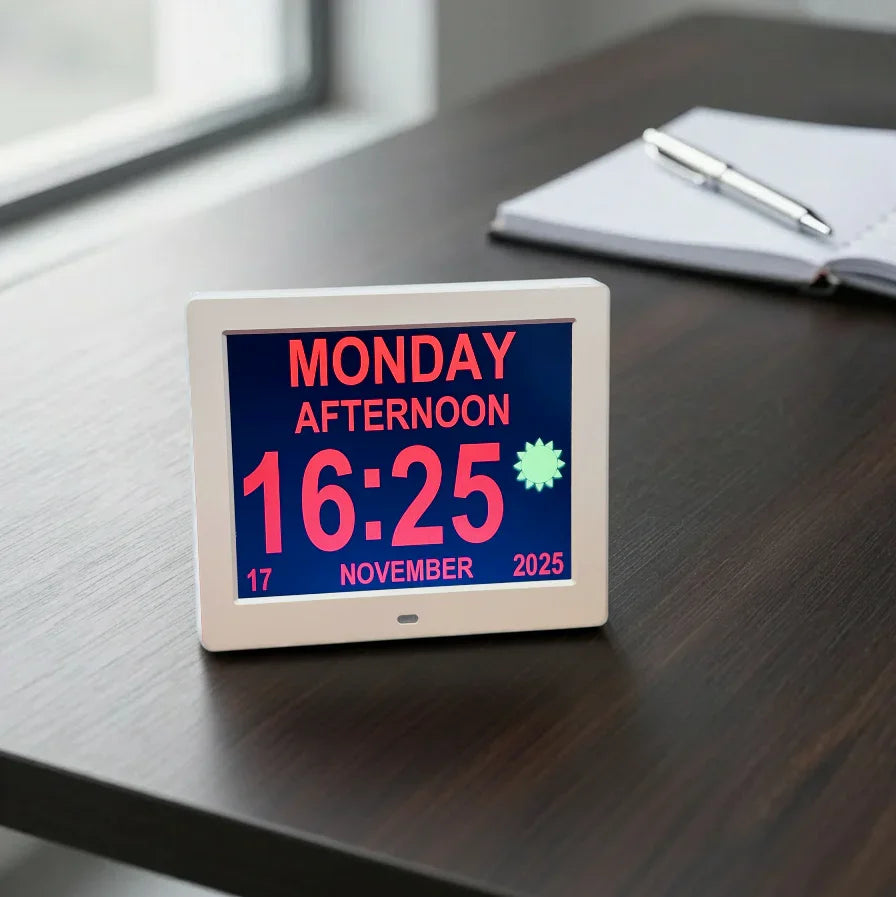 Digital day clock with large display for time, day, and date on a desk, easy to read.