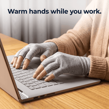 SilverWise Bamboo Compression Gloves on a woman working on her laptop