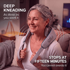 Woman in her fifties relaxing in an armchair at home wearing the DeepKnead massager over her shoulders
